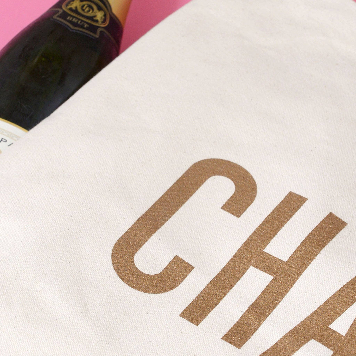 Natural Really Big Bag with ‘Champagne’ Text on a Pink Background