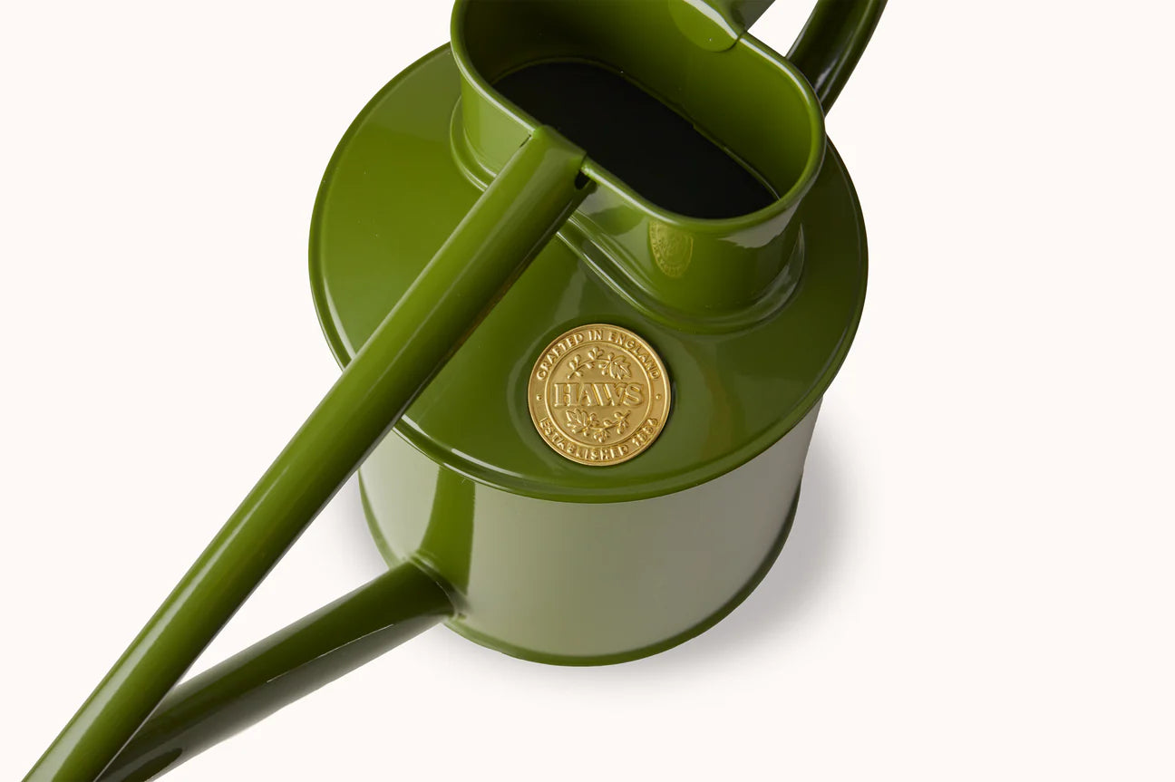 Haws Fazeley Flow Two Pint Fern Green watering can in front of a white background