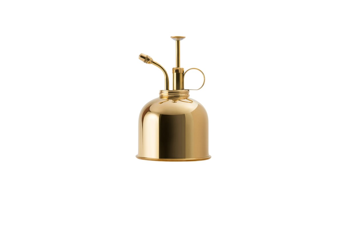 Brass Mister in front of a White Background