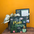 Plant Bingo a plant based board game in front of a yellow background