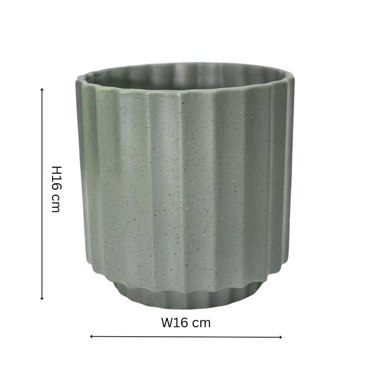 Decorative sage green ‘Bourton Scalloped’ planter with no drainage holes for indoor houseplants, cacti and succulents. 16cm in diameter. Foam pads on the base for protection. 