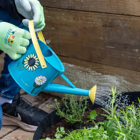 Growing Gardeners Watering Can