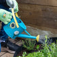 Growing Gardeners Watering Can