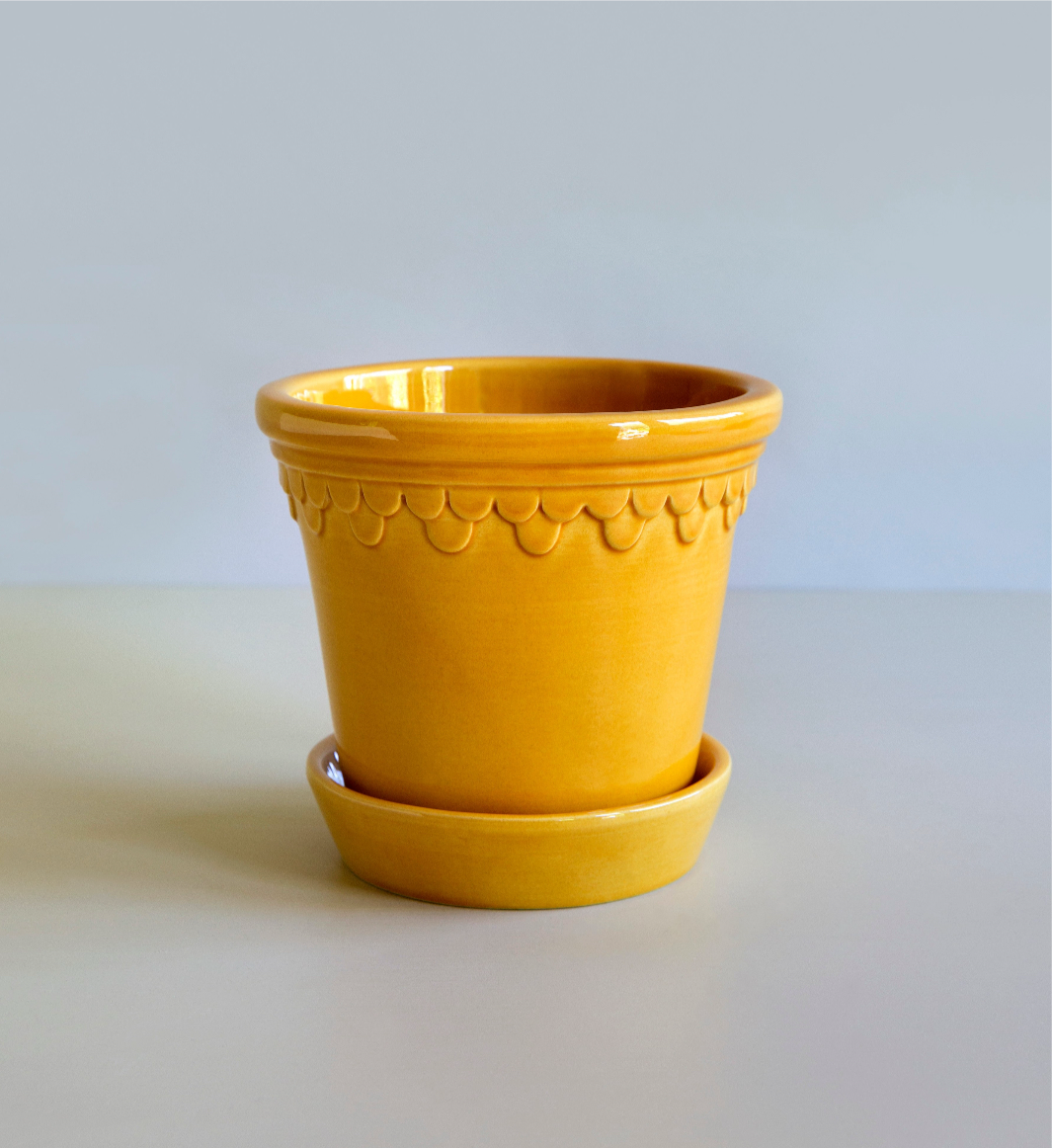 A Bergs Potter Copenhagen Amber Yellow Pot & Saucer from Urban Tropicana&