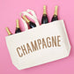 Natural Really Big Bag with ‘Champagne’ Text on a Pink Background