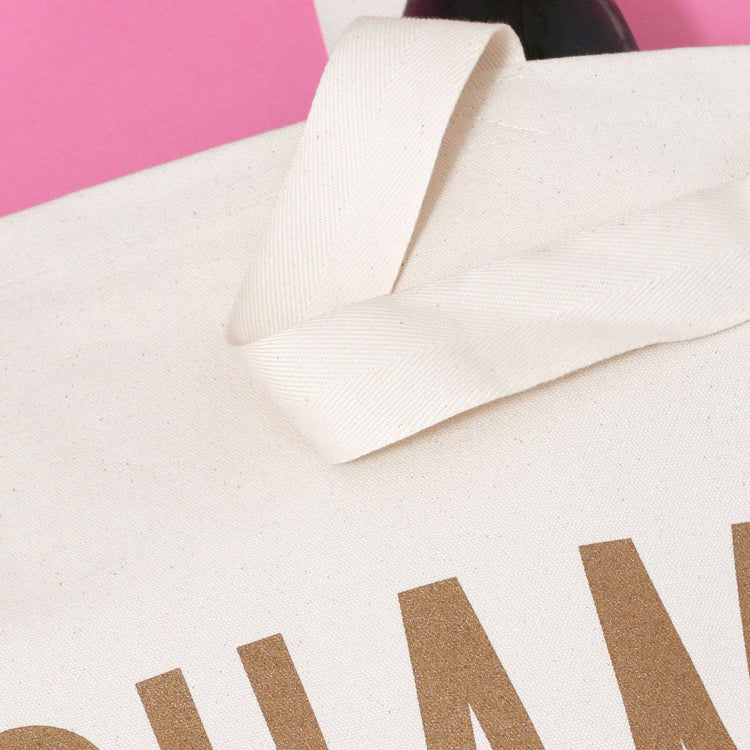 Natural Really Big Bag with ‘Champagne’ Text on a Pink Background