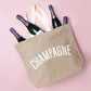 Stone Canvas Tote Bag with ‘Champagne’ text on a Pink Background