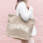Stone Canvas Tote Bag with ‘Champagne’ text on a Pink Background