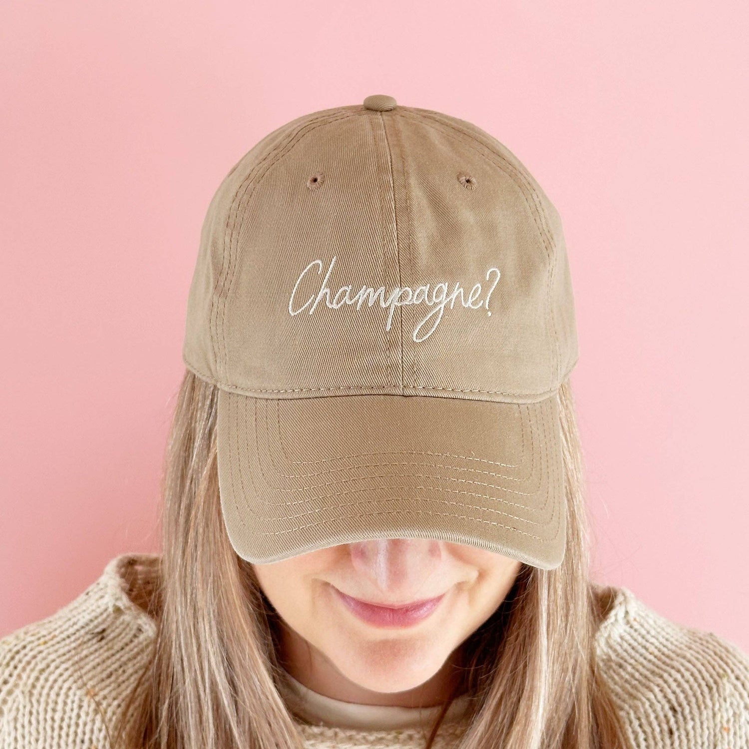 Cotton Baseball Cap with ‘Champagne?’ Text on a Pink Background