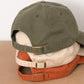 Cotton Baseball Cap with ‘Champagne?’ Text on a Neutral Background