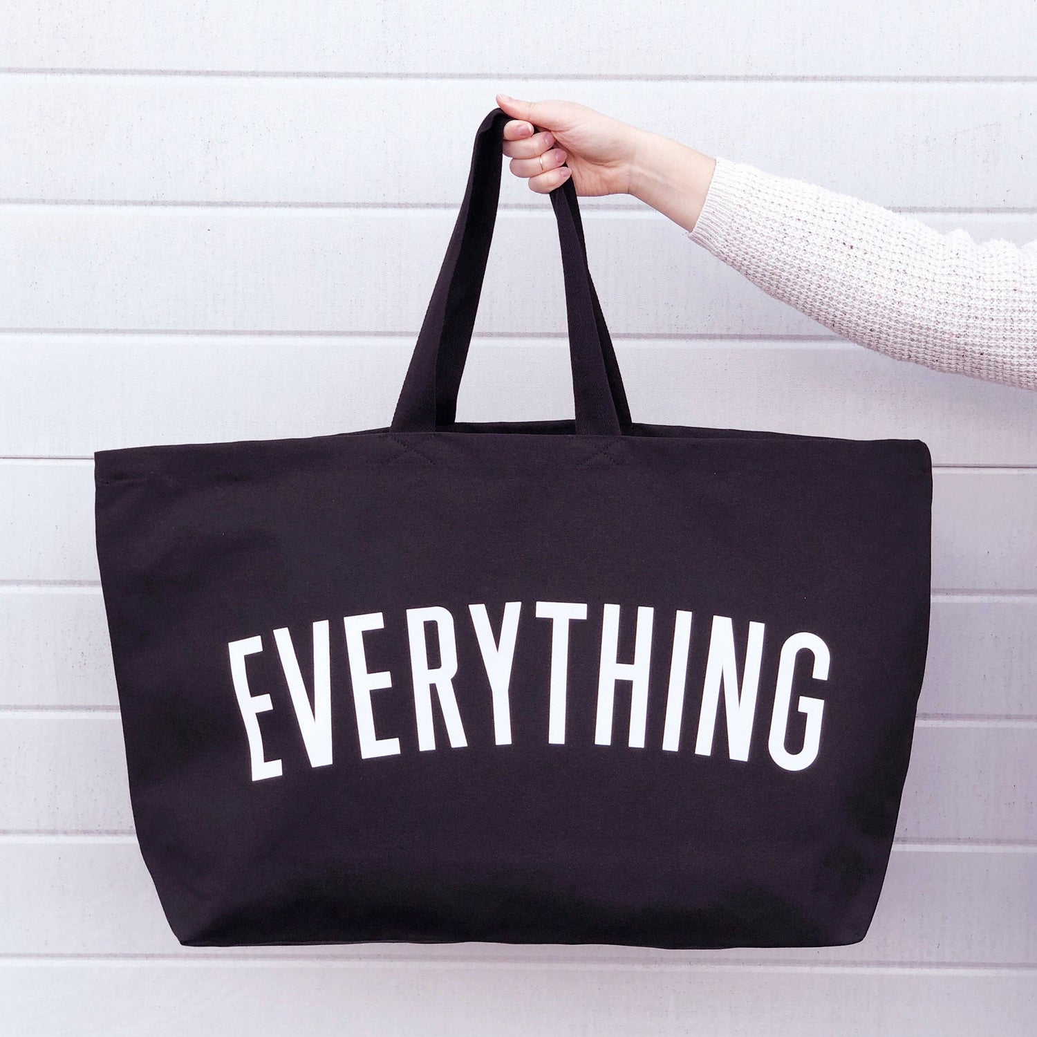 Black tote bag with &