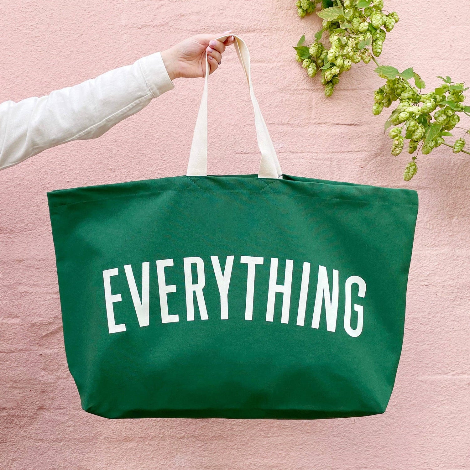 Green tote bag with &