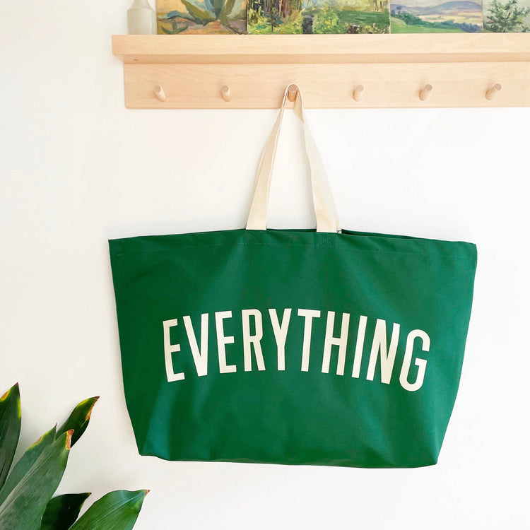 Green tote bag with &