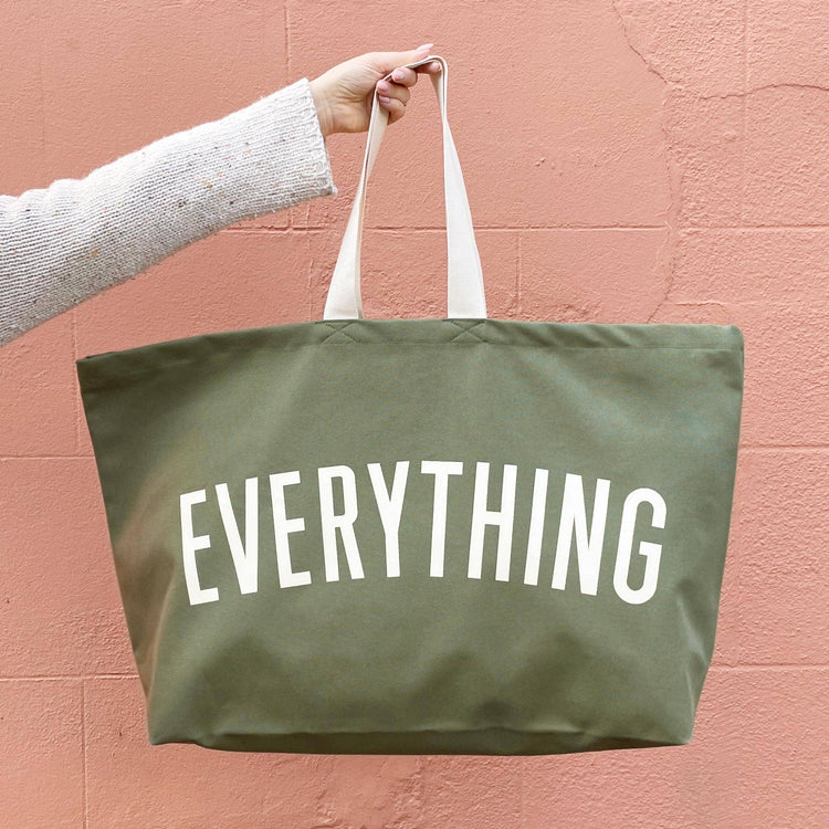 Green tote bag with &