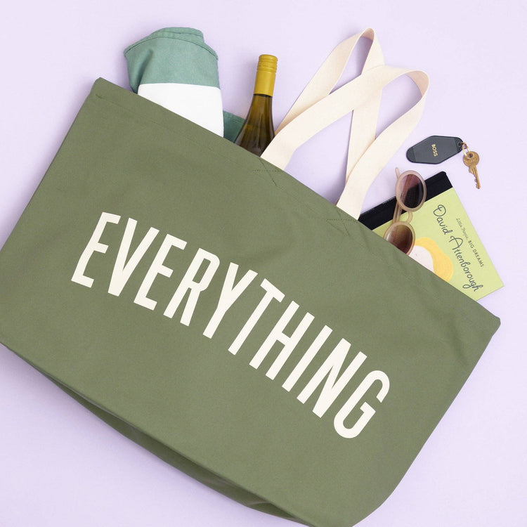 Green tote bag with &