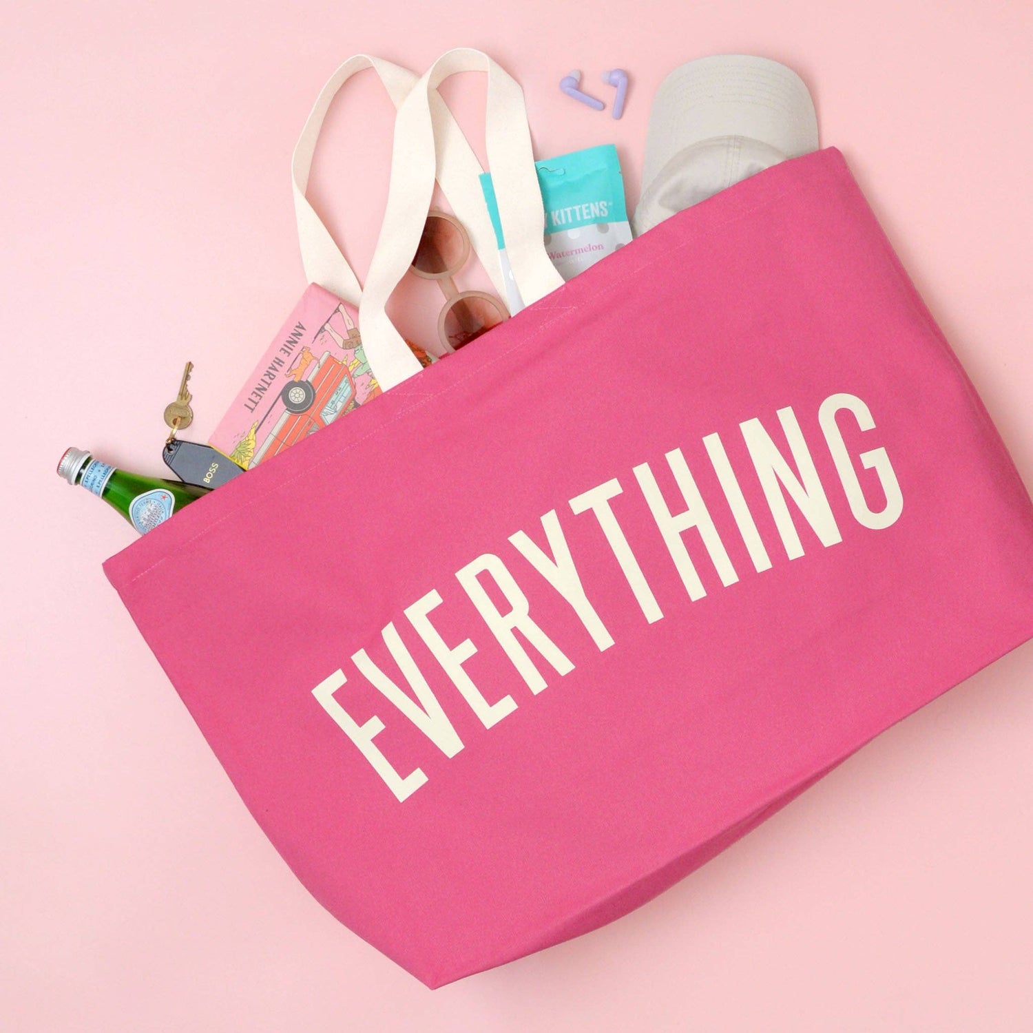 Bright Pink Really Big Bag with ‘Everything’ Text on a Pink Background
