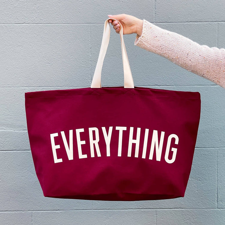 Burgundy Really Big Bag with ‘Everything’ Text on a Blue Background