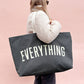Grey Really Big Bag with ‘Everything’ Text on a Pink Background
