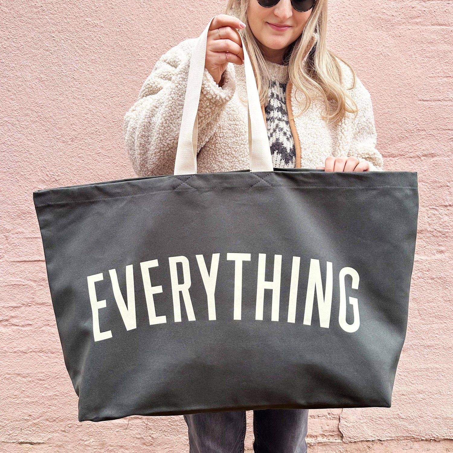 Grey Really Big Bag with ‘Everything’ Text on a Yellow Background
