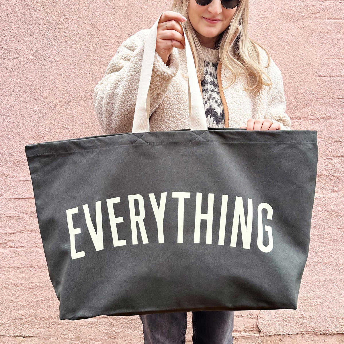Grey Really Big Bag with ‘Everything’ Text on a Yellow Background