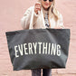 Grey Really Big Bag with ‘Everything’ Text on a Yellow Background