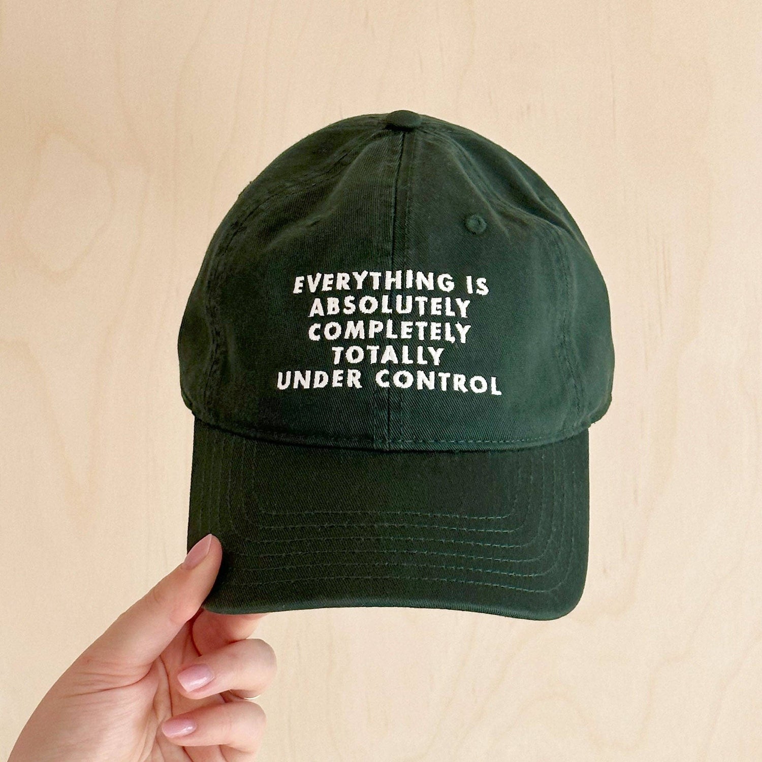 Cotton Baseball Cap with ‘Everything is Under Control’ text on a Yellow Background