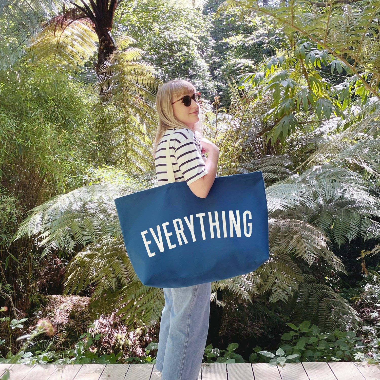Ocean Blue Really Big Bag with ‘Everything’ Text on a Leafy Background