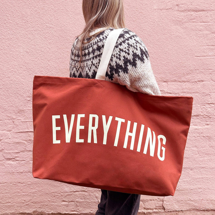 Rust Really Big Bag with ‘Everything’ Text on a Pink Background