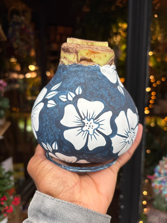 A Hand Painted Blue Amaryllis in front of Urban Tropicana’s Plant Shop in Chiswick London
