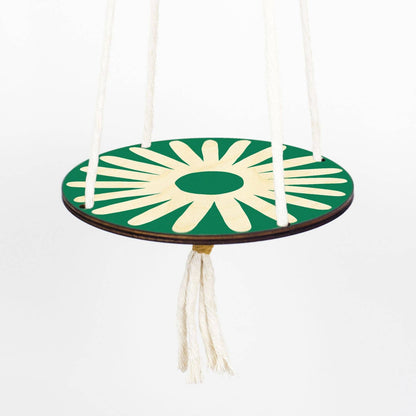 Hanging macrame plant shelf. Green and white daisy print with natural white macrame twine and brass plated hoops. Made in England. 