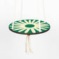 Hanging macrame plant shelf. Green and white daisy print with natural white macrame twine and brass plated hoops. Made in England. 