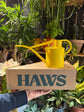 Haws Fazeley Flow Two Pint Lotus Yellow watering can in front of a white background