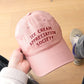 Dusty Rose Cotton Baseball Cap with ‘Ice Cream Appreciation Society’ Text on a Neutral Background