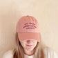 Person Wearing a Dusty Rose Cotton Baseball Cap with ‘Ice Cream Appreciation Society’ Text on a white Background