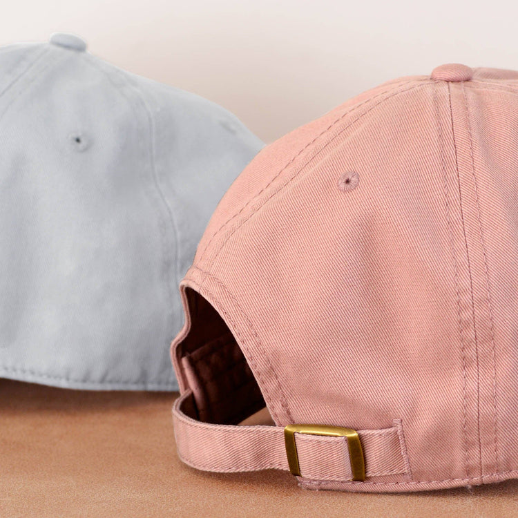 Dusty Rose Cotton Baseball Cap with ‘Ice Cream Appreciation Society’ Text on a Neutral Background
