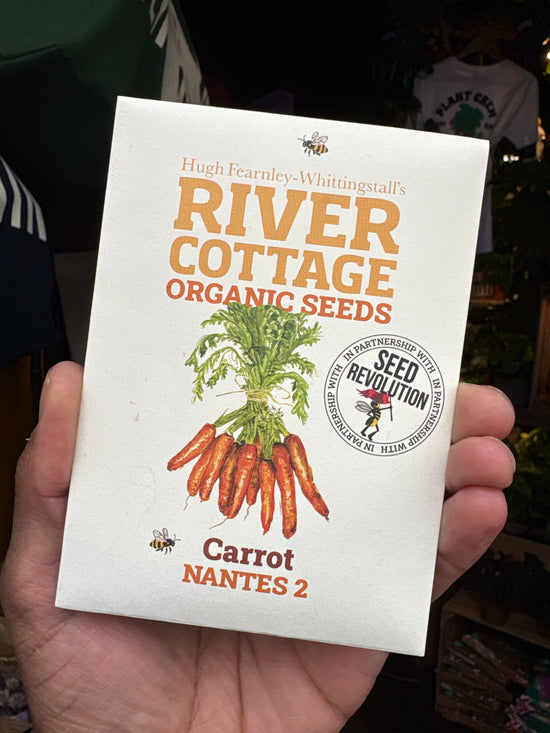 River Cottage organic seed pack outside Urban Tropicana plant shop in Chiswick, London