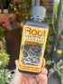 Root Ultra 300ml in front of Urban Tropicana, a plant shop in London. Promotes healthy roots and minimises transplant shock. 