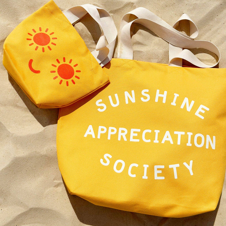 Yellow tote bag with &