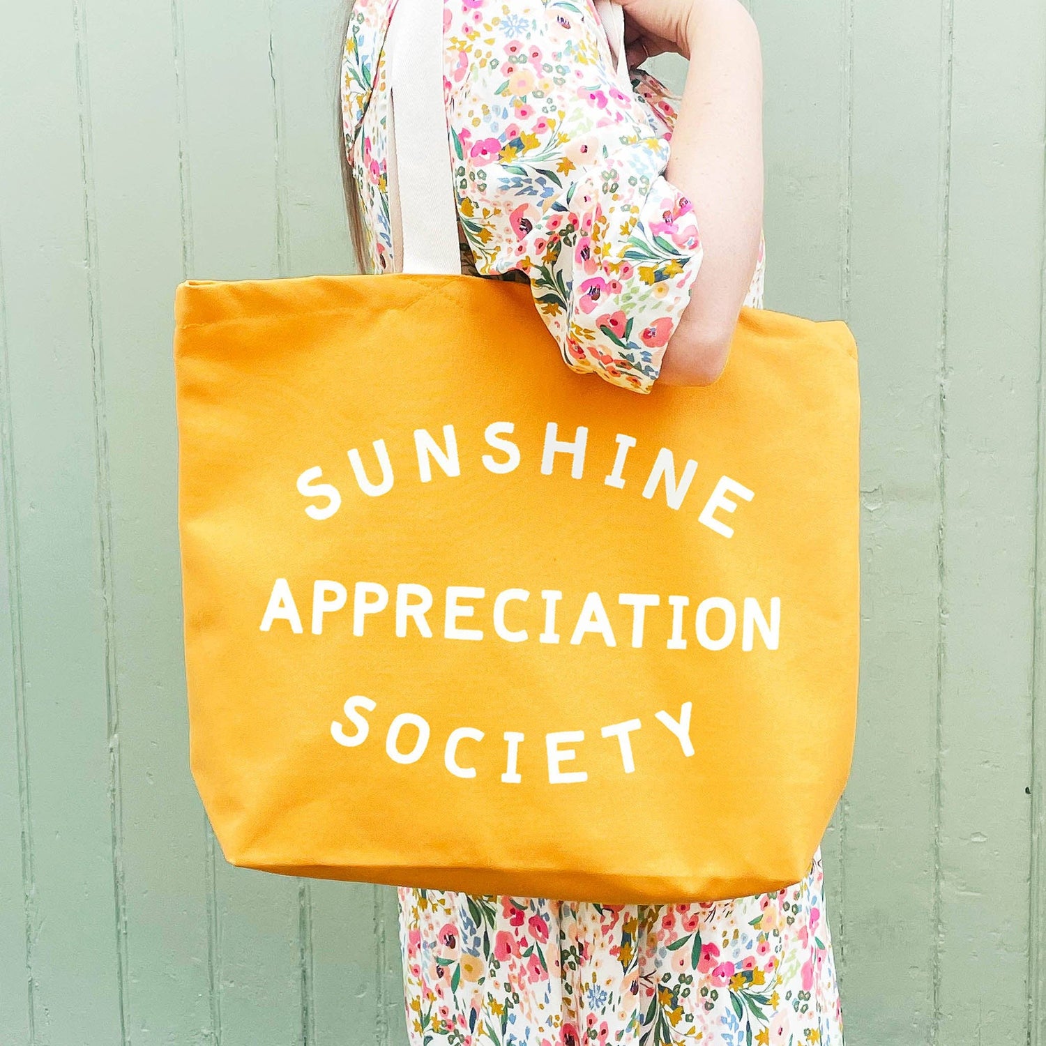 Yellow tote bag with &