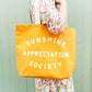 Yellow tote bag with &