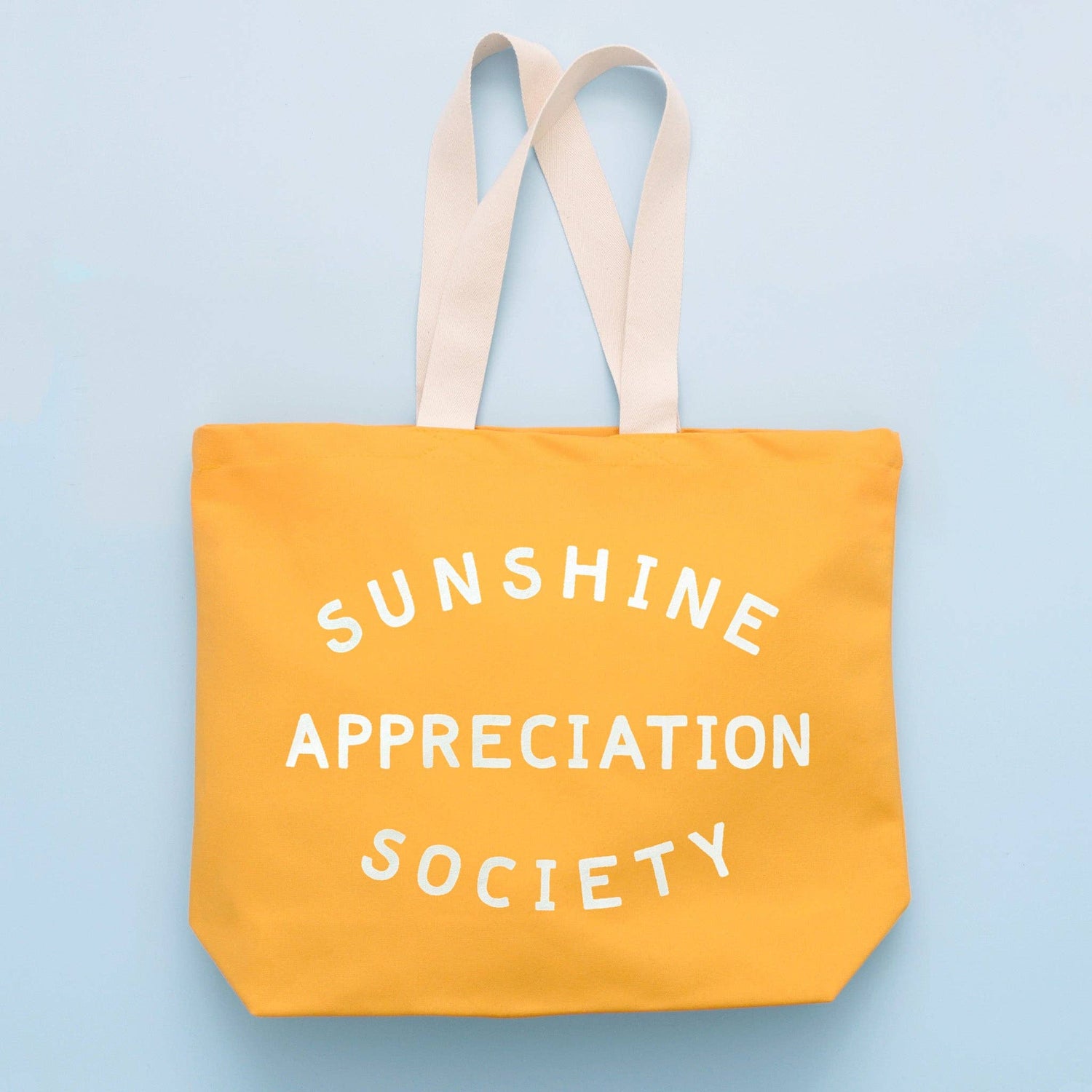 Yellow tote bag with &