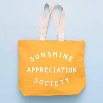 Yellow tote bag with &