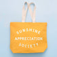 Yellow tote bag with &