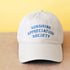 Off-White Cotton Baseball Cap with ‘Sunshine Appreciation Society’ text on a Neutral Background