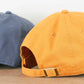Cotton Baseball Cap with ‘Sunshine Appreciation Society’ text on a Neutral Background