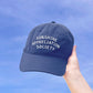 Vintage Blue Cotton Baseball Cap with ‘Sunshine Appreciation Society’ Text on a Sky Background