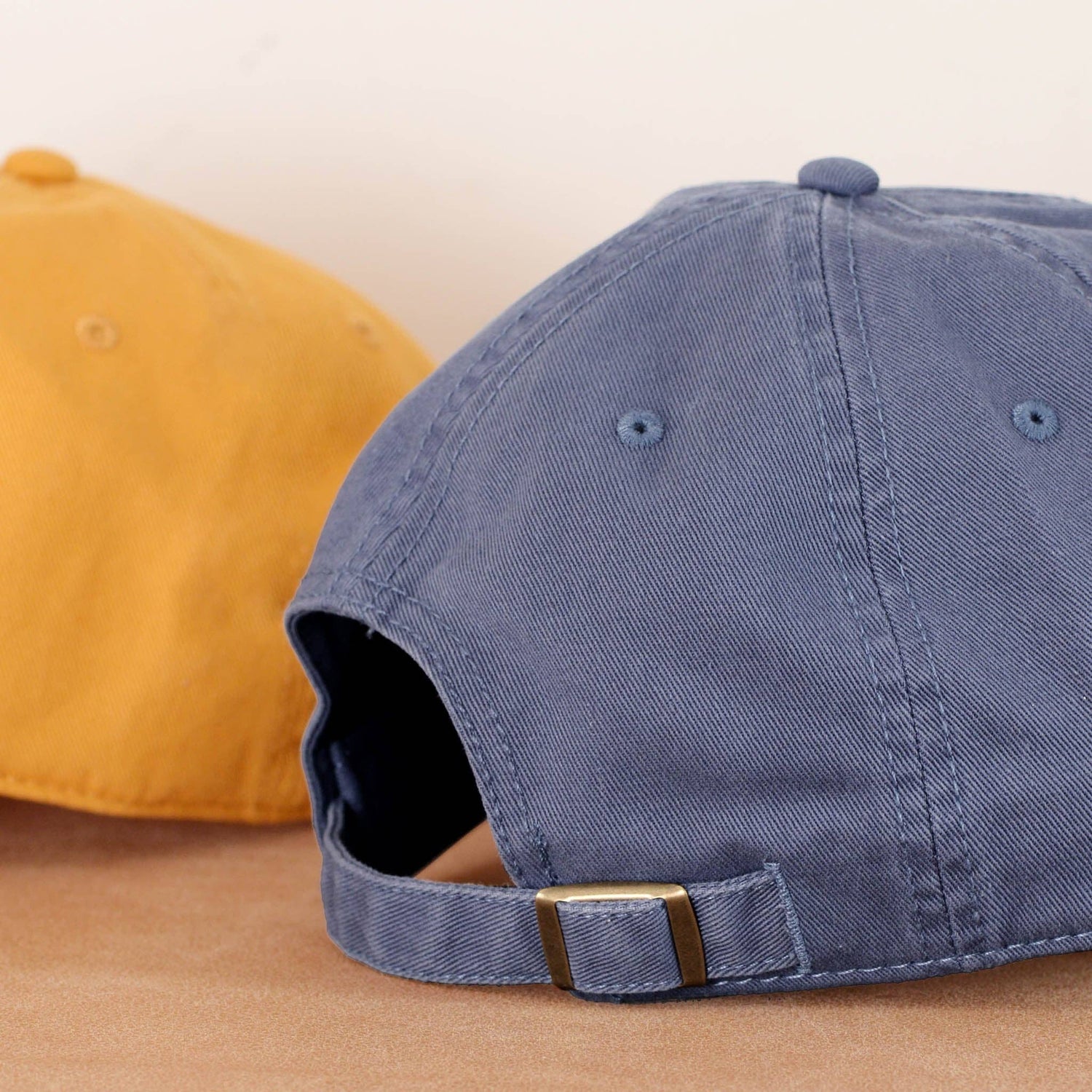 Vintage Blue Cotton Baseball Cap with ‘Sunshine Appreciation Society’ Text on a Neutral Background