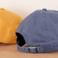 Vintage Blue Cotton Baseball Cap with ‘Sunshine Appreciation Society’ Text on a Neutral Background