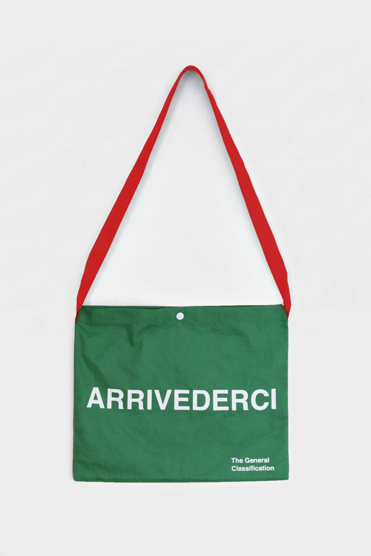 Green reusable canvas tote bag with red handles and bold white "Ciao" and ‘Arrivederci’ graphic by The General Classification. Eco-friendly cotton shopping bag with modern minimalist design, ideal for everyday use, groceries, travel, and casual fashion.