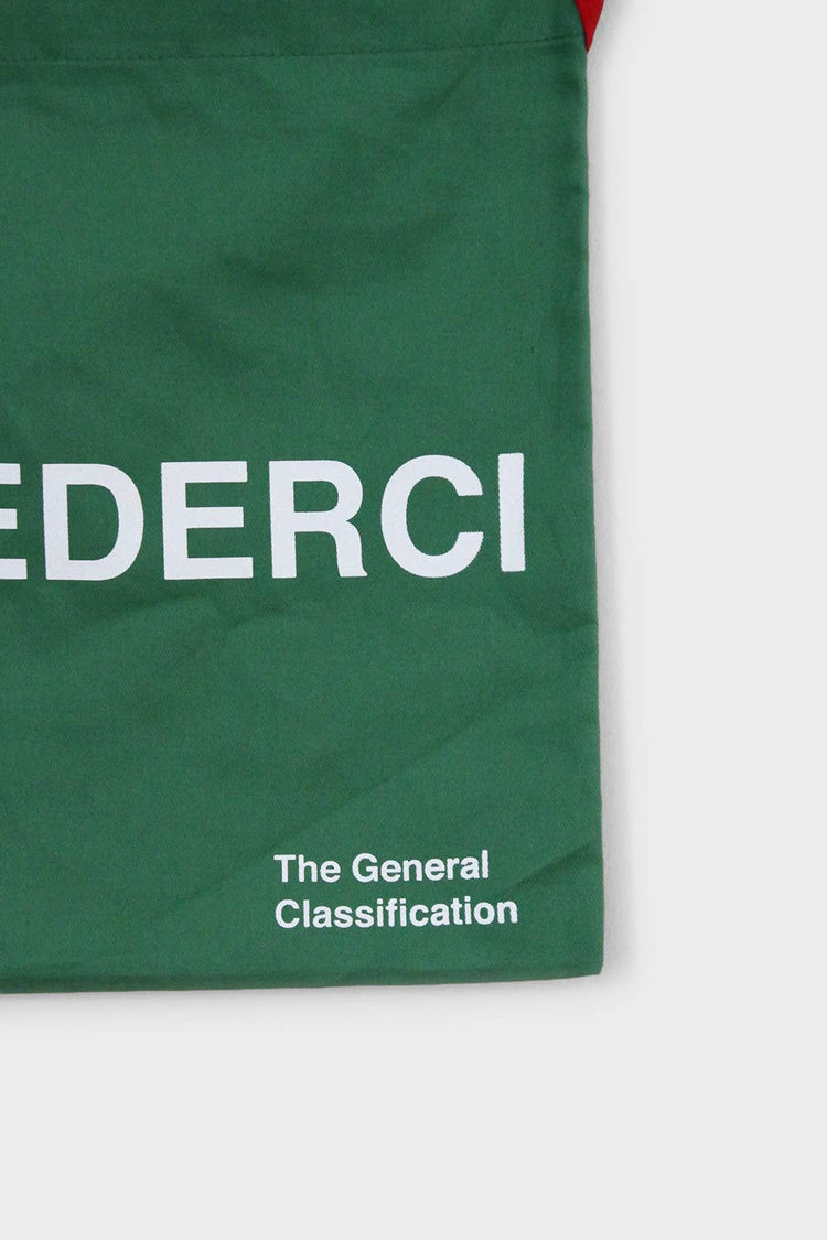 Green reusable canvas tote bag with red handles and bold white "Ciao" and ‘Arrivederci’ graphic by The General Classification. Eco-friendly cotton shopping bag with modern minimalist design, ideal for everyday use, groceries, travel, and casual fashion.
